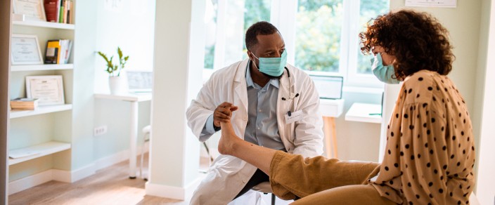 physician talking with a patient