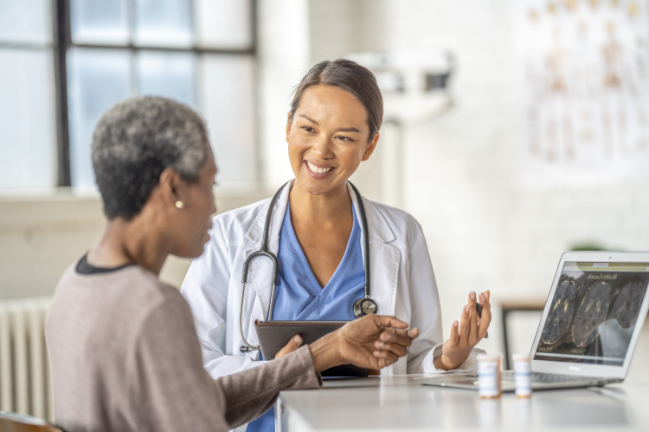 Neurological Care Female neuro doctor with patient