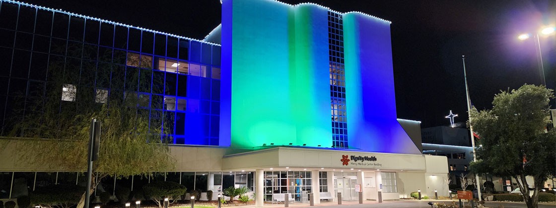 Mercy Medical Center Redding - lit up blue and green